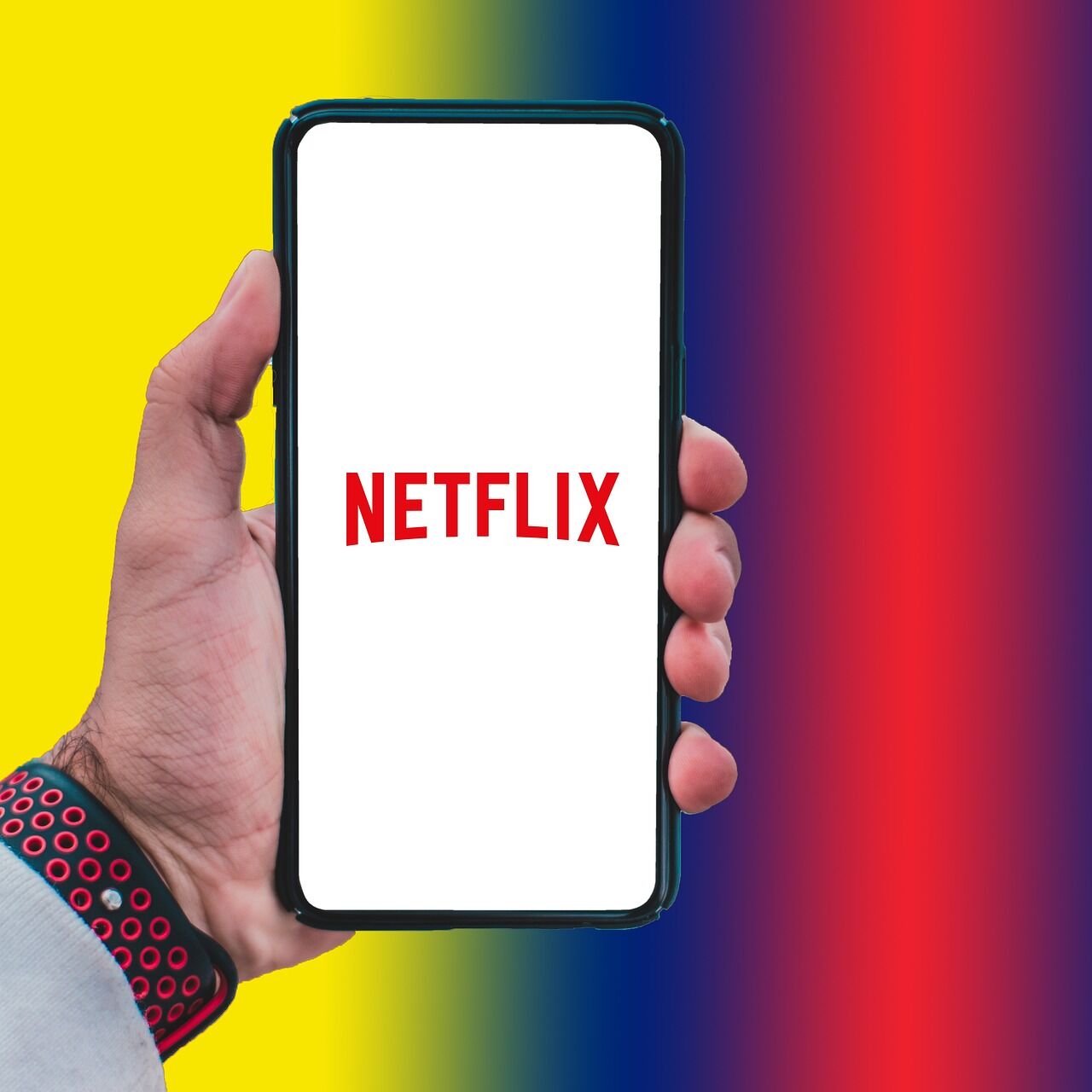 A person watching Netflix on a smartphone